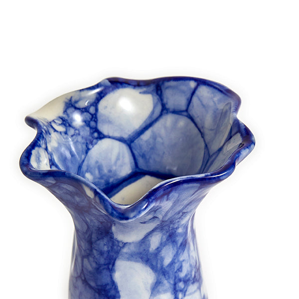 small blue and white ceramic vase